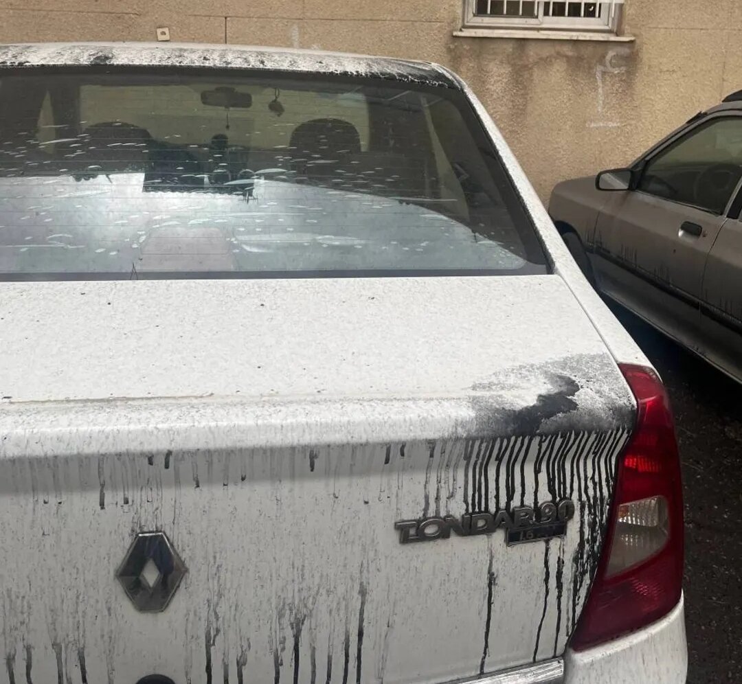 سازمان جهانی بهداشت: در باران سیاه از خانه بیرون نروید